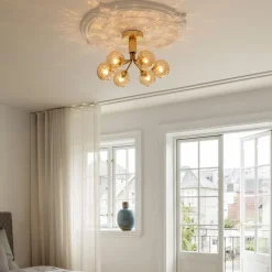 Discount Nuura Apiales 6 taklampe børstet / optic gold glass Messing